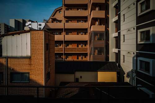 city brown high rise tenement building high rise