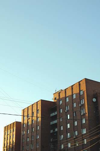 city brown painted building high rise