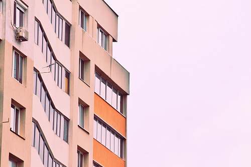 city building facade during day time high rise