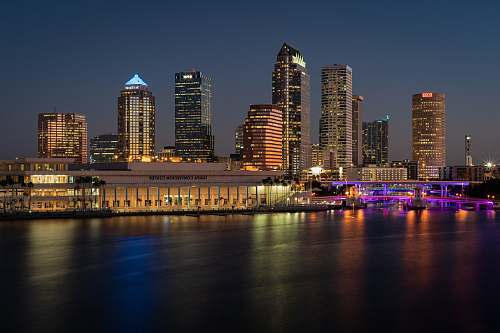 city buildings near body of water town