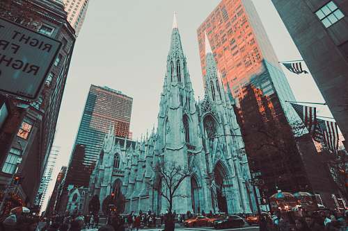 city cathedral between high-rise buildings downtown