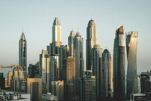 city city buildings under sunny sky skyscraper