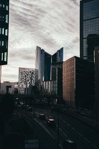 city city under cloudy sky road