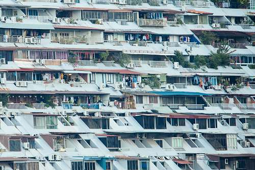 city close photo of houses high rise