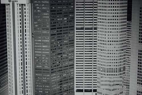 city closeup photo of concrete building black-and-white