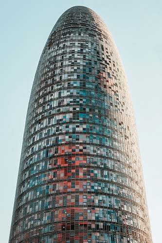 city closeup photo of grey high-rise building town