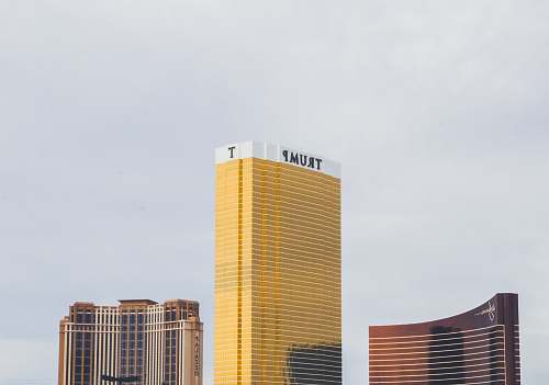 city gold-colored Trump high-rise building between of two gold-colored buildings las vegas