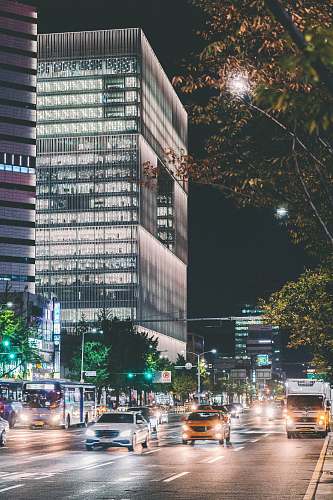 city gray glass building metropolis