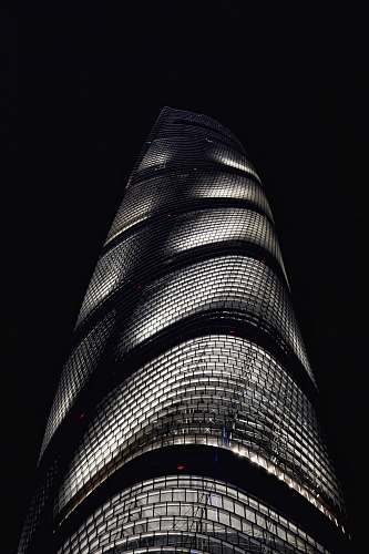 city grayscale photography of tower high rise