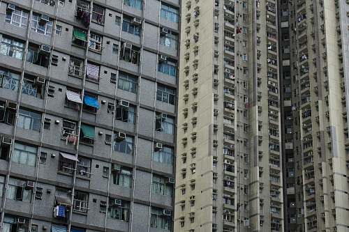 city grey concrete high-rise building high rise