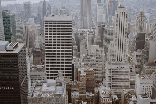 city grey high-rise buildings metropolis
