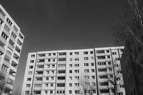 city greyscale photo of buildng black-and-white