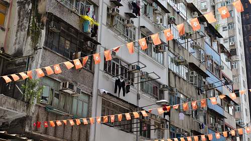 city hanged red buntings high rise