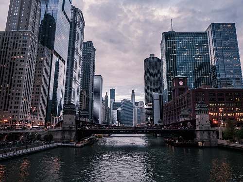 city high rise building under gray sky urban