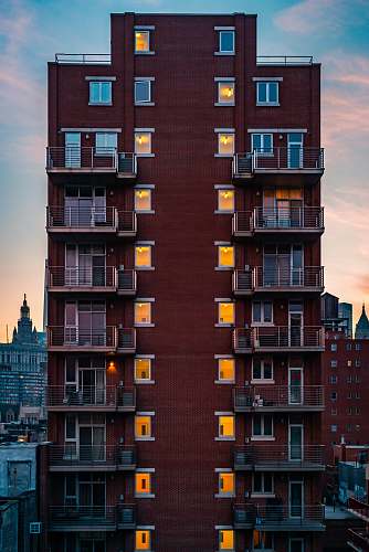 city high-rise building with balconies during day home decor