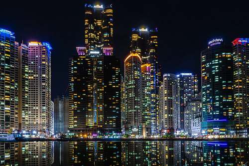 town lighted buildings during nighttime urban