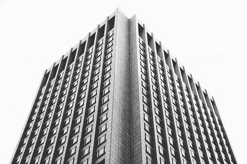 city low angel photography of building black-and-white