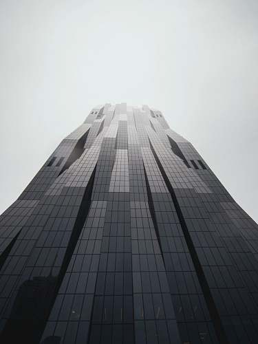 urban low-angle photography of black building town