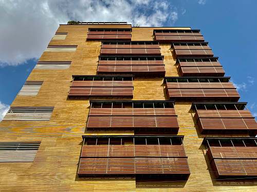 city low angle photography of building during daytime high rise