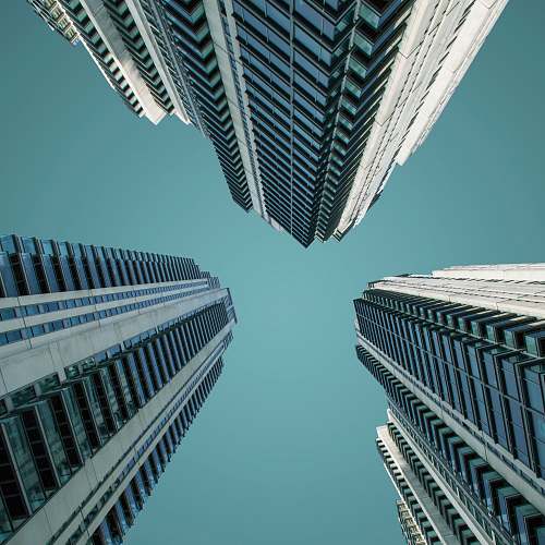 city low angle photography of high-rise buildngs high rise