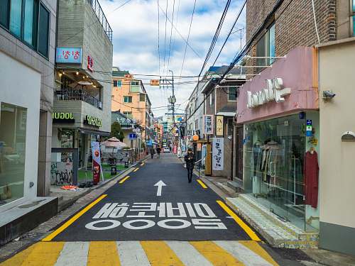 city man walking on street road