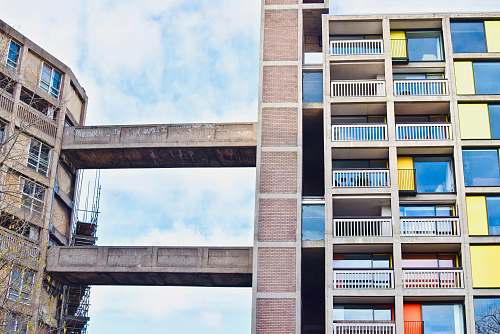 city multicolored concrete glass buildings high rise