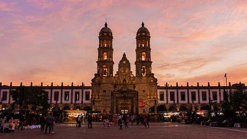 city people in front of cathedral downtown