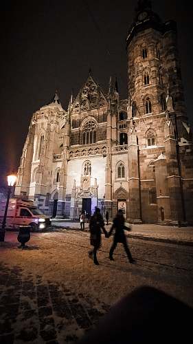 city people near cathedral downtown