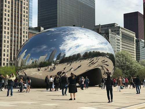 city people standing near dome building urban