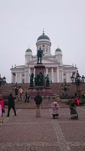 city people walking near Helsinki Cathedral during daytime downtown