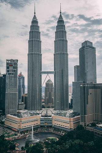 city Petronas Twin Towers, Kuala Lumpur, Malaysia during daytime high rise