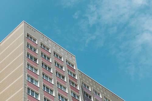 city pink and beige concrete building high rise