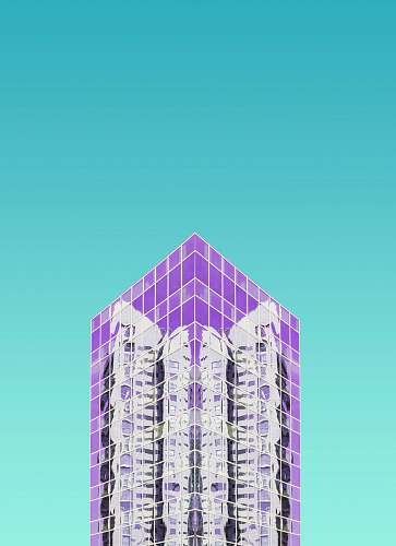 city purple curtain wall building at daytime urban
