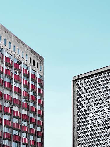 city red and white concrete building high rise
