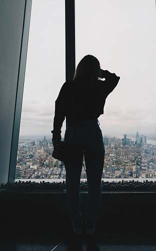 town silhouette photo of woman urban