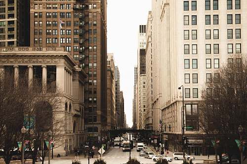 city street between high-rise buildings town