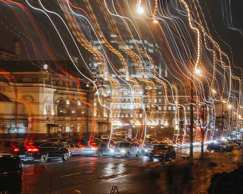city time lapse photography of vehicles and buildings metropolis