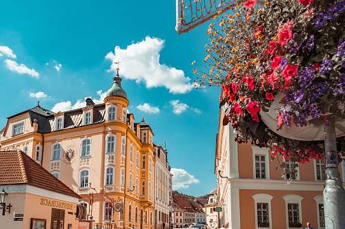 town two brown buildings during daytime urban