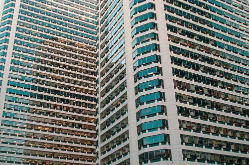 city view of glass high rise buildings high rise