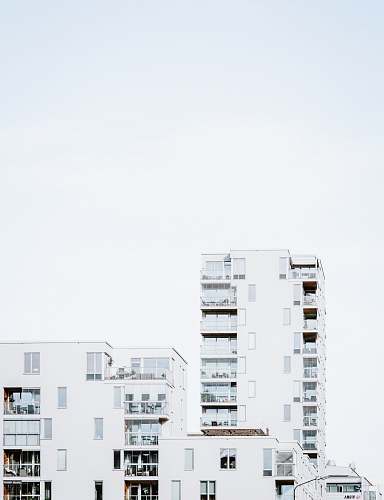 city view photography of white concrete building high rise