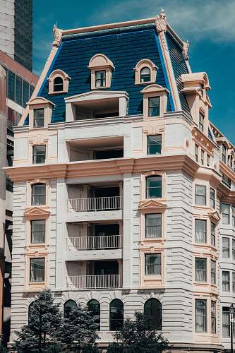 city white and blue building high rise