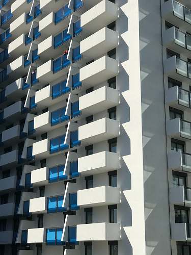 city white and blue high rise building high rise