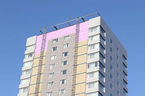 city white and gray painted building high rise