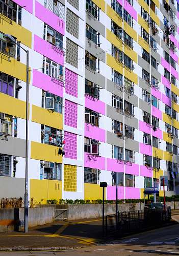 city white and pink concrete building high rise