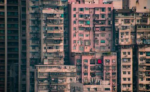 city white and pink concrete high-rise buildings during daytime urban