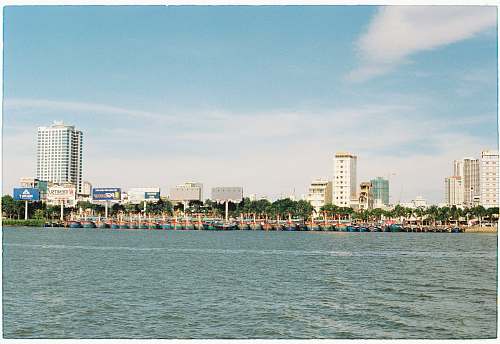 city white building and ocean scenery metropolis