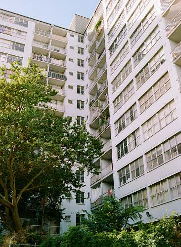 city white concrete buildings close-up photography high rise