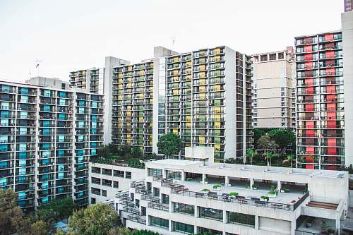 housing white concrete buildings during daytime condo
