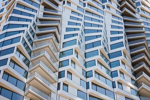 urban white glass building high rise