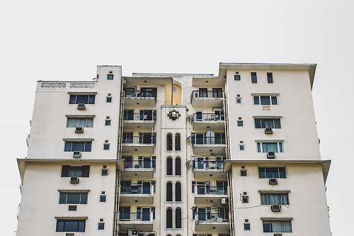 city white high-rise building during daytime high rise
